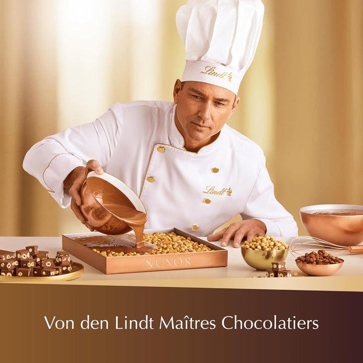 Lindt Schokolade NUXOR Weiss, Promotion | 103G Beutel | Cremige Weisse Schokolade Mit Ganzen, Gerösteten Haselnüssen | Pralinen-Geschenk | Schokoladengeschenk