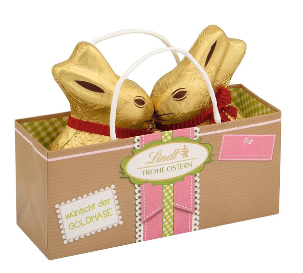 Lindt Schokolade Beauty of Nature GOLDHASEN | 100 G Tasche | Farbenfrohe Geschenkverpackung | 2 X GOLDHASE Vollmilch | Oster Schokolade | Schokoladengeschenk | Schokoladenhase | Osterhase